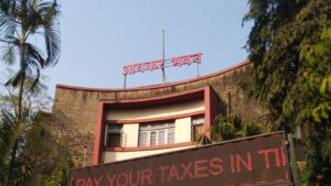 Aaykar Bhavan, an Income Tax Department office building in Pune, with a red aaykar bhavan sign and an electronic display reading pay your taxes in time