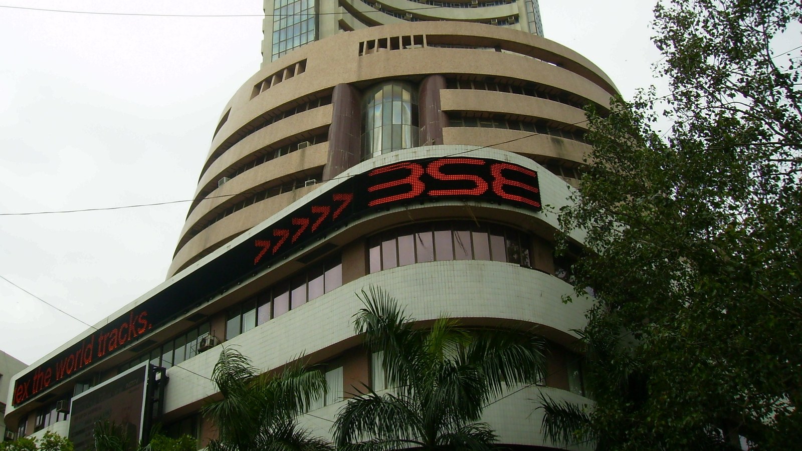 The Bombay Stock Exchange building in Mumbai with its illuminated BSE ticker sign, the exchange where Adroit Industries and other new IPOs list alongside the NSE