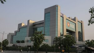 The National Stock Exchange headquarters building in Mumbai, with its NSE logo visible on the glass facade, the exchange that listed its own shares on September 24, 2026